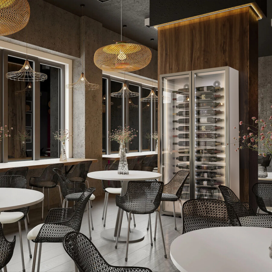 Weinkühlschrank mit edlen Weinen der in einem Restaurant steht, das modern und cool eingerichtet ist Weinkühlschrank mit edlen Weinen der in einem Restaurant steht, das modern und cool eingerichtet ist